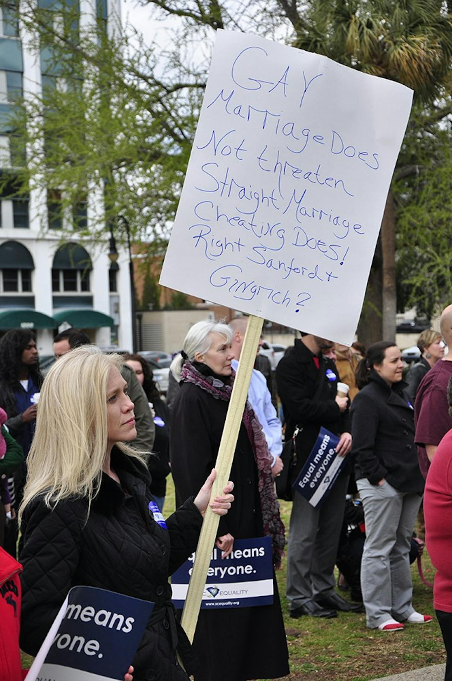 Many protesters at Tuesday's rally for same-sex marriage brought signs that expressed their opposition to Proposition 8 and the Defense of Marriage Act.