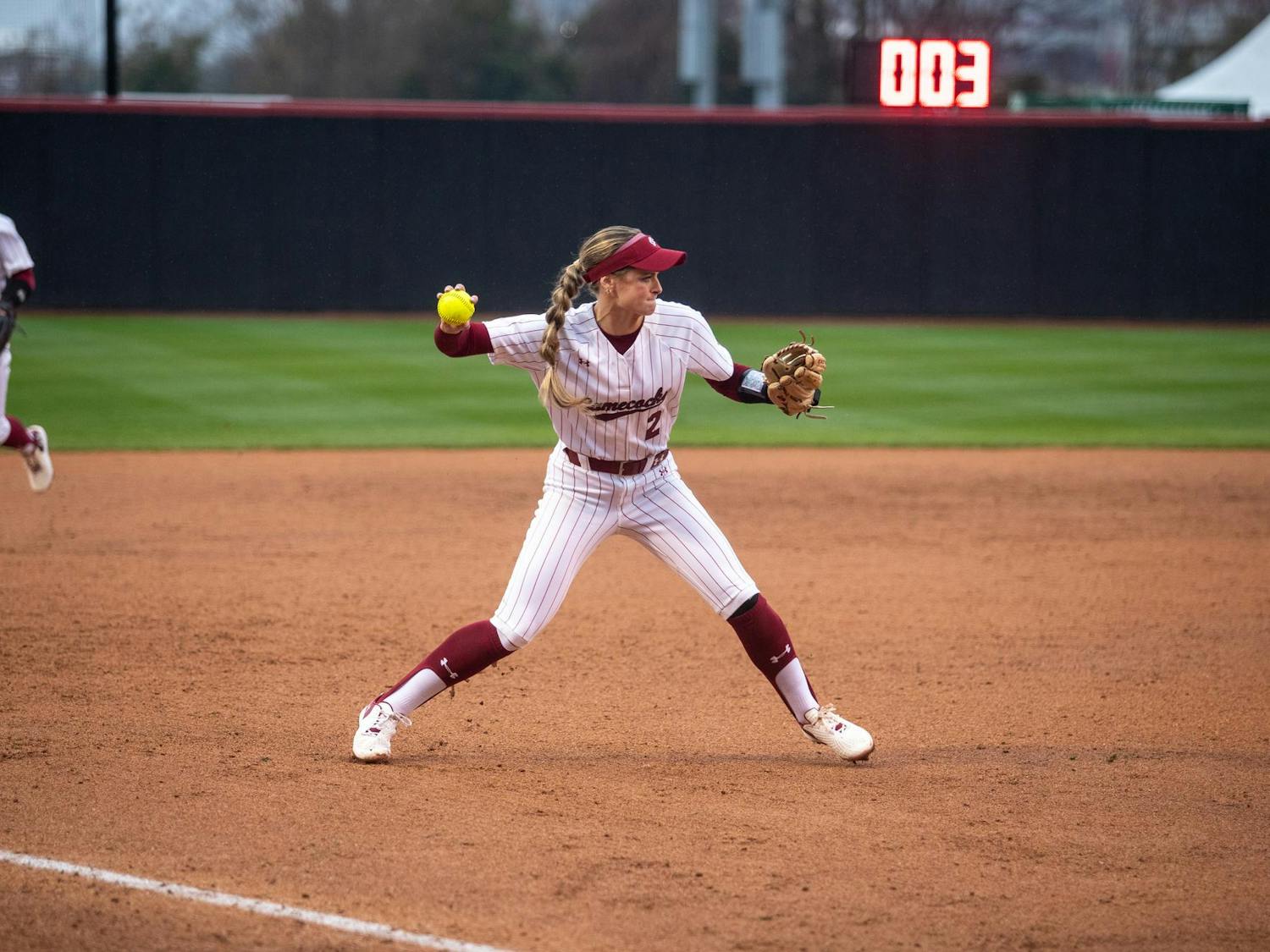 Senior infielder Ella Chancey makes a throw to first to get out a Miami Ohio batter on Feb. 15, 2025. Chancey has three putouts on the season.