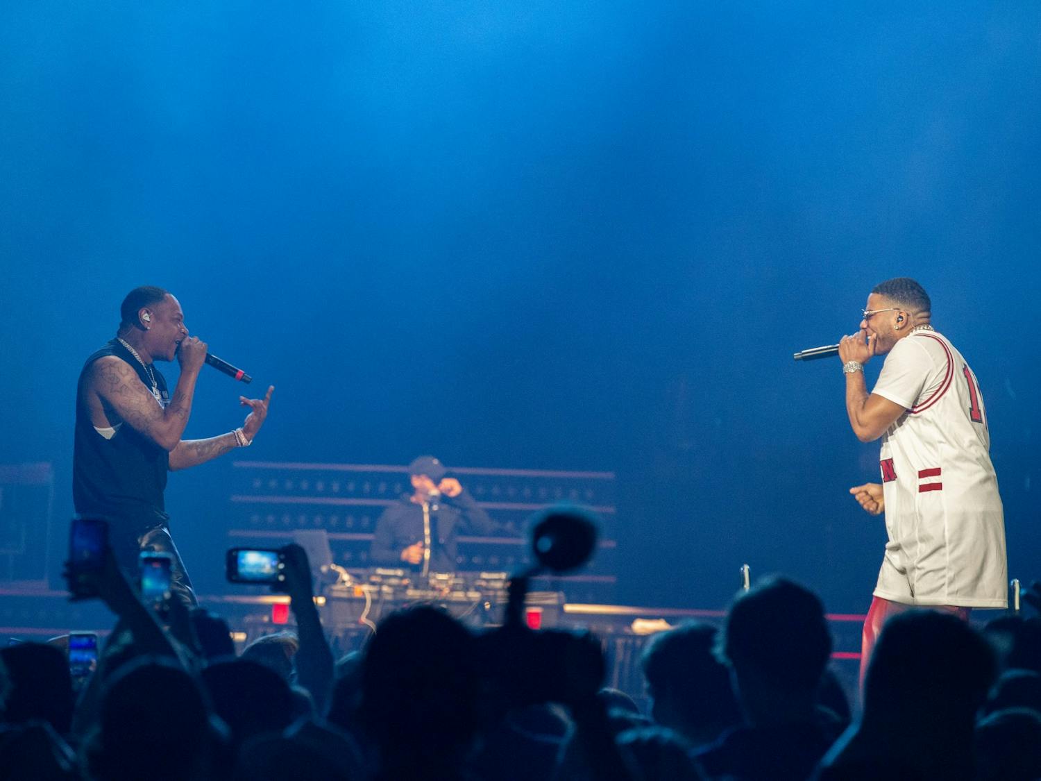 Nelly raps with his little brother, Lavell “City Spud” Webb on stage during the opening act of the Darius Rucker concert at Colonial Life Arena on April 24, 2022. The concert was held as a celebration for the women's basketball team.