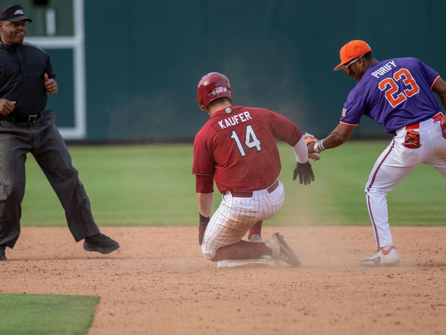 Junior catcher Max Kaufer slides safely into second base against the Clemson Tigers at Fluor Field on March 1, 2025. South Carolina fell to Clemson, 5-1, in the Saturday afternoon matchup at the neutral site ballpark. 