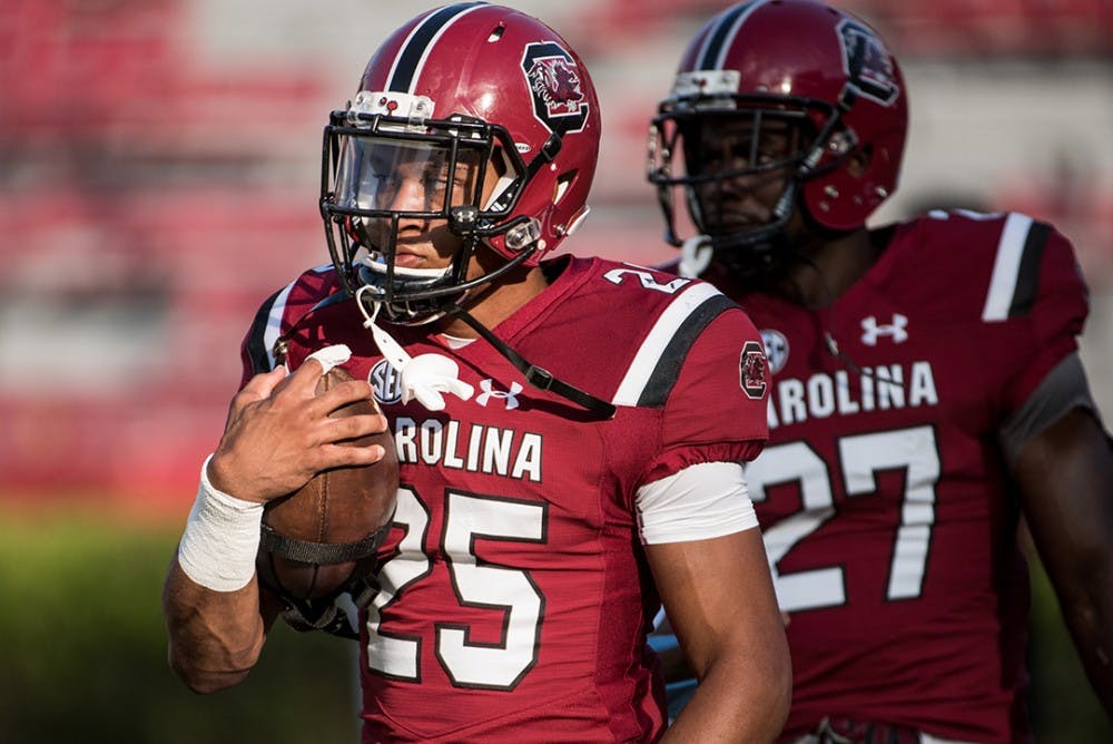 South Carolina running back A.J. Turner carries the ball during football practice Wednesday evening at Williams Brice Stadium. 8/17/16