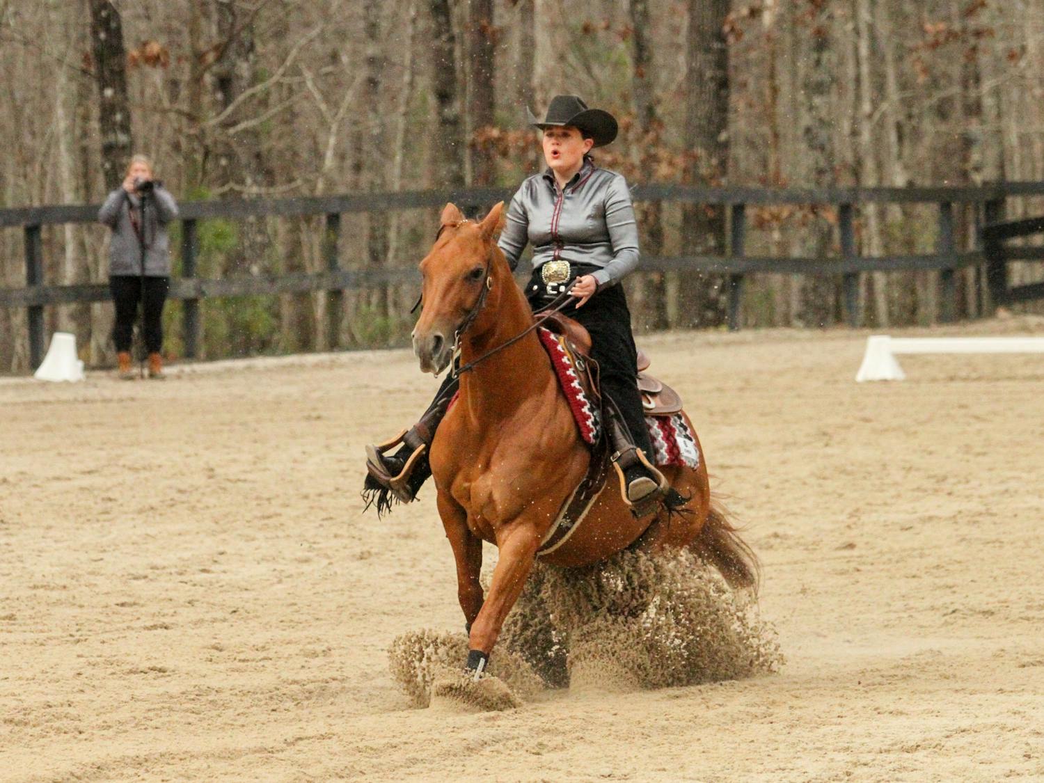 Senior Mary Margaret Coats, mounted on Chexie, competes in the reigning category during the meet against Texas A&amp;M at One Wood Farm on Feb. 11, 2023. One of her favorite memories from competing for the University of South Carolina over the past four years was celebrating Senior Day. “It’s really because all the parents come out, (and) everyone is screaming as loud as you possibly can. We’ve had some crazy wins on Senior Day and it really just makes you realize how appreciative we are of everyone on the team,” Coats said.