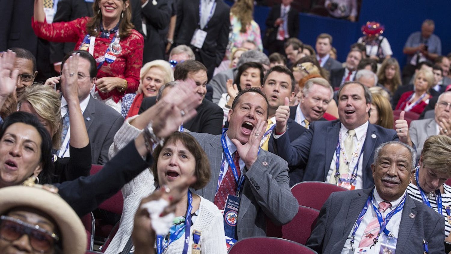 Delegates cheer after GOP officials upheld a voice vote on a rules package during the Republican National Convention in Cleveland on Monday, July 18, 2016. (Brian van der Brug/Los Angeles Times/TNS)