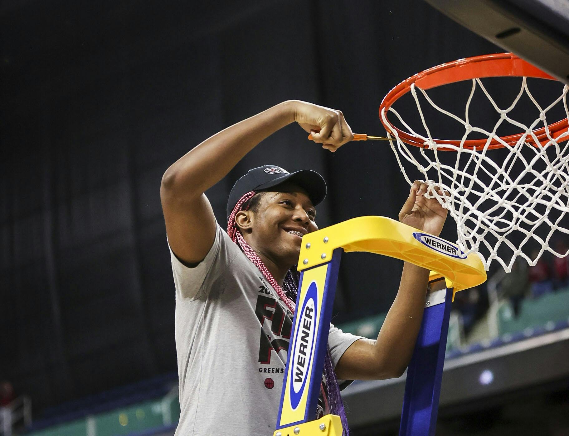 Junior forward Aliyah Boston cuts the net after South Carolina defeated Creighton 80-50 in the Elite Eight on Sunday, March 27, 2022, advancing to the Final Four.