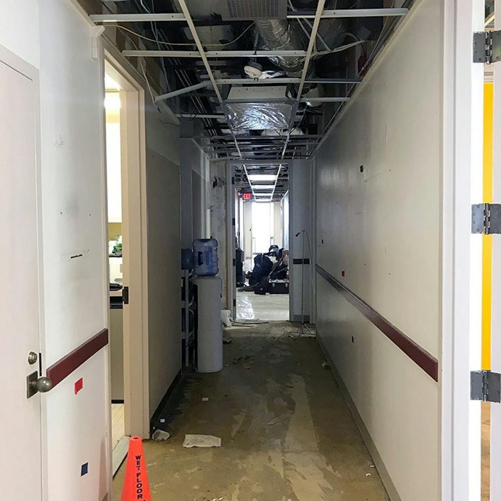 <p>A hallway in the J. Welsh Humanities Office Building has been damaged by the recent flood.</p>