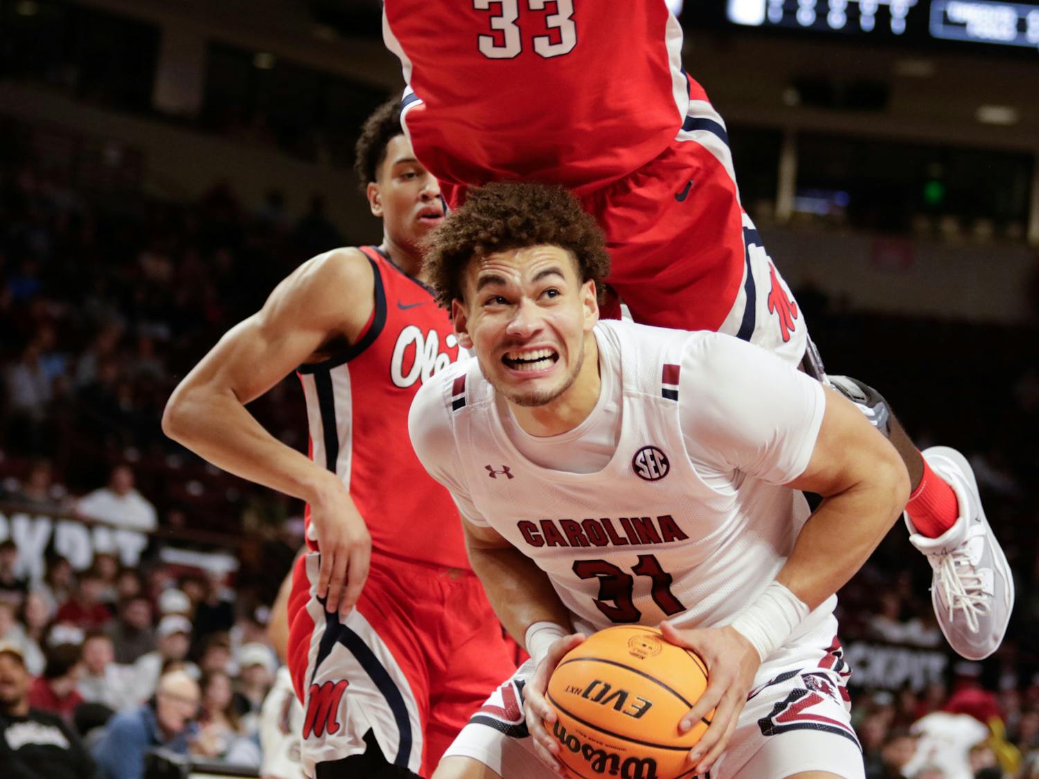 Redshirt junior forward Benjamin Bosmans-Verdonk gets fouled by a player from Ole Miss during the first half of the game at Colonial Life Arena on Jan. 17, 2023. The South Carolina Gamecocks lost to the Rebels 70-58.