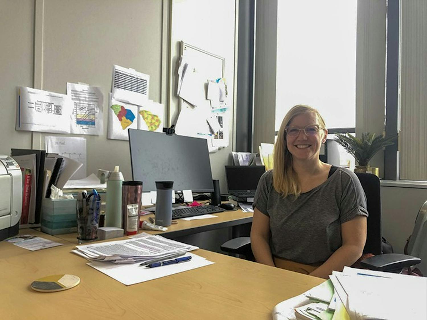 Jessica Bradshaw sits at her desk at the Institute for the Mind and Brain at USC. Bradshaw is the director of the Early Social Development Lab.&nbsp;