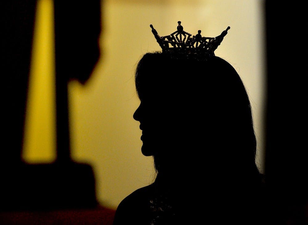 Reigning Miss California 2011 Noelle Freeman watches over the 58 Miss California contestants during a welcoming reception at City Hall in Fresno, California, Saturday, June 23, 2012. Freeman, a native of Carlsbad, California, placed fifth in the Miss America 2012 pageant. (John Walker/Fresno Bee/MCT)