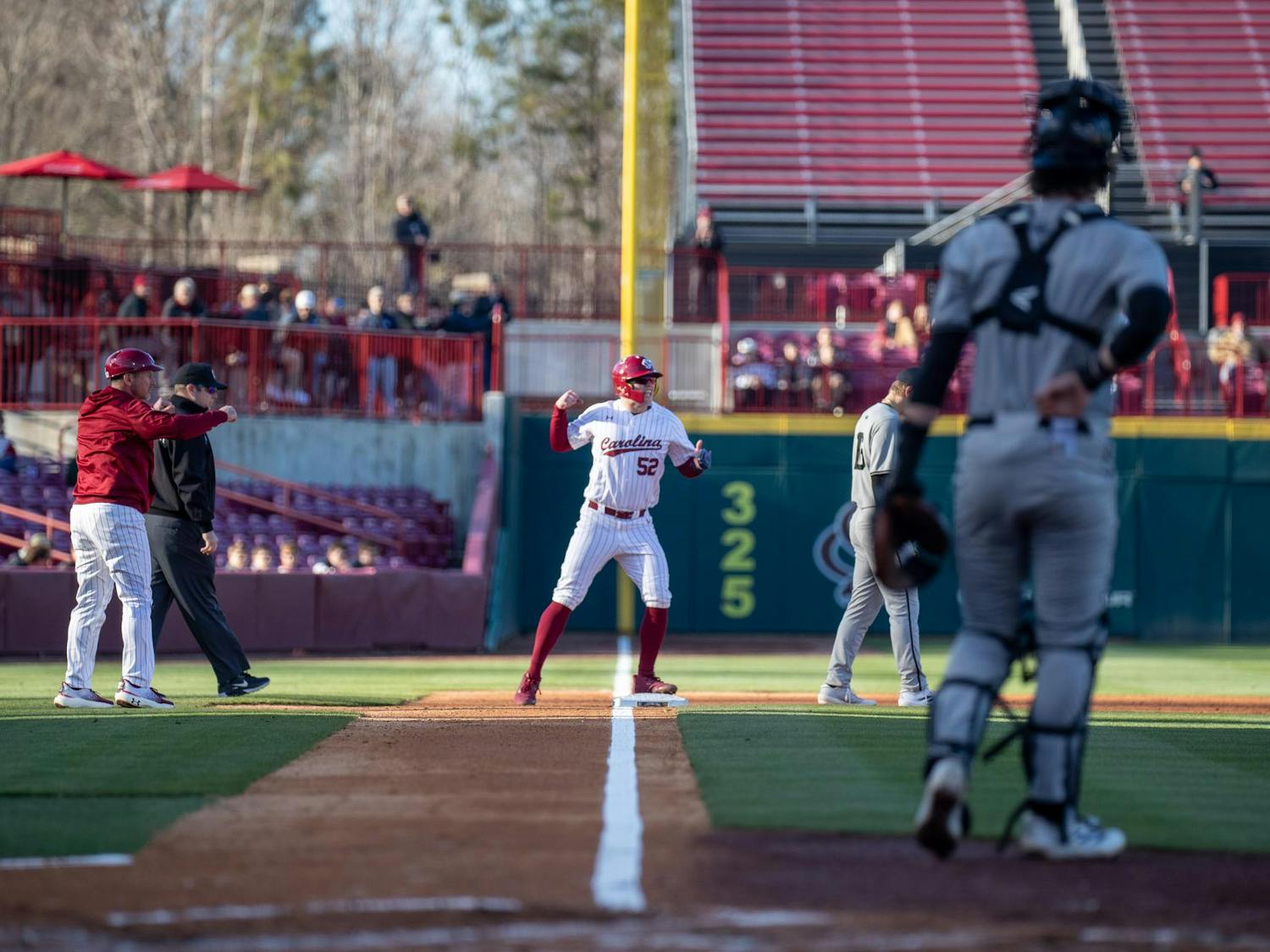 Junior outfielder Jase Woita celebrates as the Gamecocks begin to rally against Milwaukee on Feb. 21, 2025. Woita had a season high in hits, home runs, runs scored and runs batted in against the Panthers.