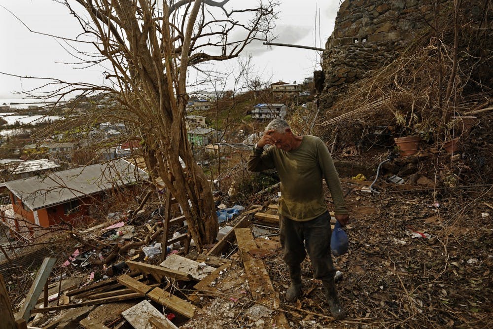 On the hill above Cruz Bay on St. John Island, the house where Eugenio Santana Santana, 61, was living was completely blown away by Hurricane Irma. Nothing remains. Originally from Dominica, Santana says he will stay and help rebuild the island because there is no work in his own country. (Carolyn Cole/Los Angeles Times/TNS)