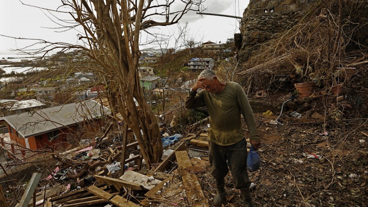 On the hill above Cruz Bay on St. John Island, the house where Eugenio Santana Santana, 61, was living was completely blown away by Hurricane Irma. Nothing remains. Originally from Dominica, Santana says he will stay and help rebuild the island because there is no work in his own country. (Carolyn Cole/Los Angeles Times/TNS)