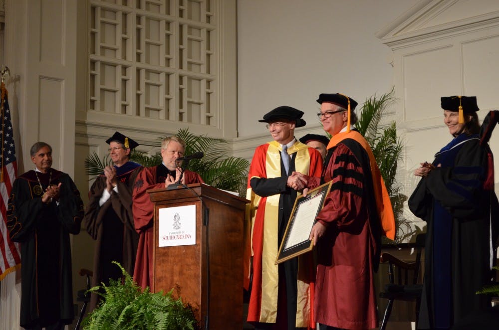 	Zafer Gurdal (second from right) was honored Monday as the new chairman and technical director of the McNair Center.