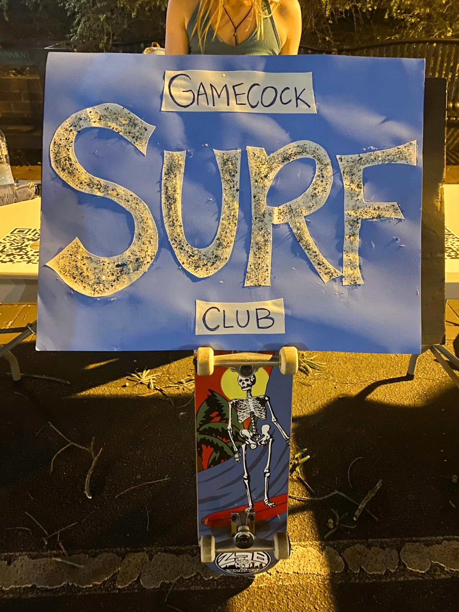 The Gamecock Surf Club promotes its organization on Greene Street during the fall 2023 semester. Despite the club being new, it has veteran leadership experience with fourth-year environmental studies student, Isabelle Paris, a former vice president of the Mountaineering and White Water Club.&nbsp;