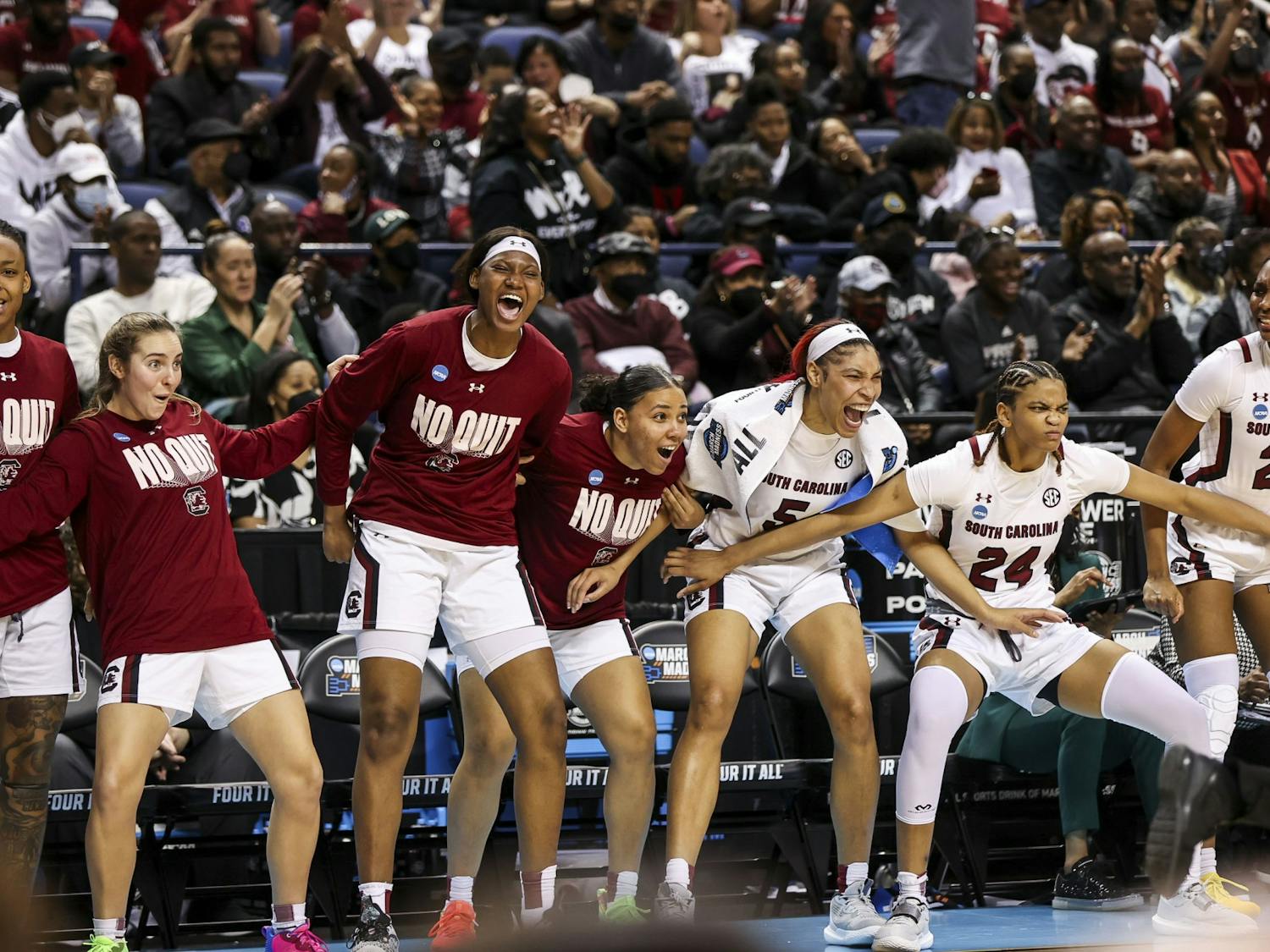Gamecock's bench celebrating during the second quarter of South Carolina's 80-50 victory over Creighton in the Elite Eight on Sunday, March 27, 2022. The win propelled the team to the Final Four.&nbsp;