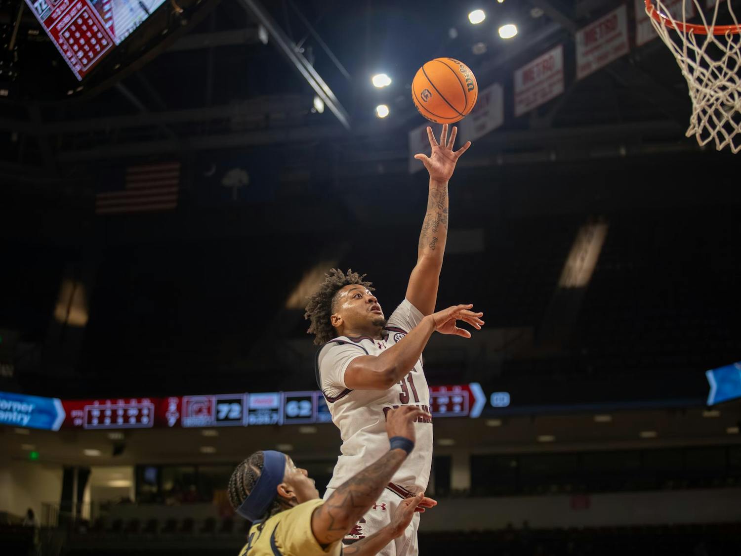 Junior forward Elijah Strong performs a layup during the game against Charleston Southern on Nov. 28, 2025. The Gamecocks defeated the Cavaliers 74-62.