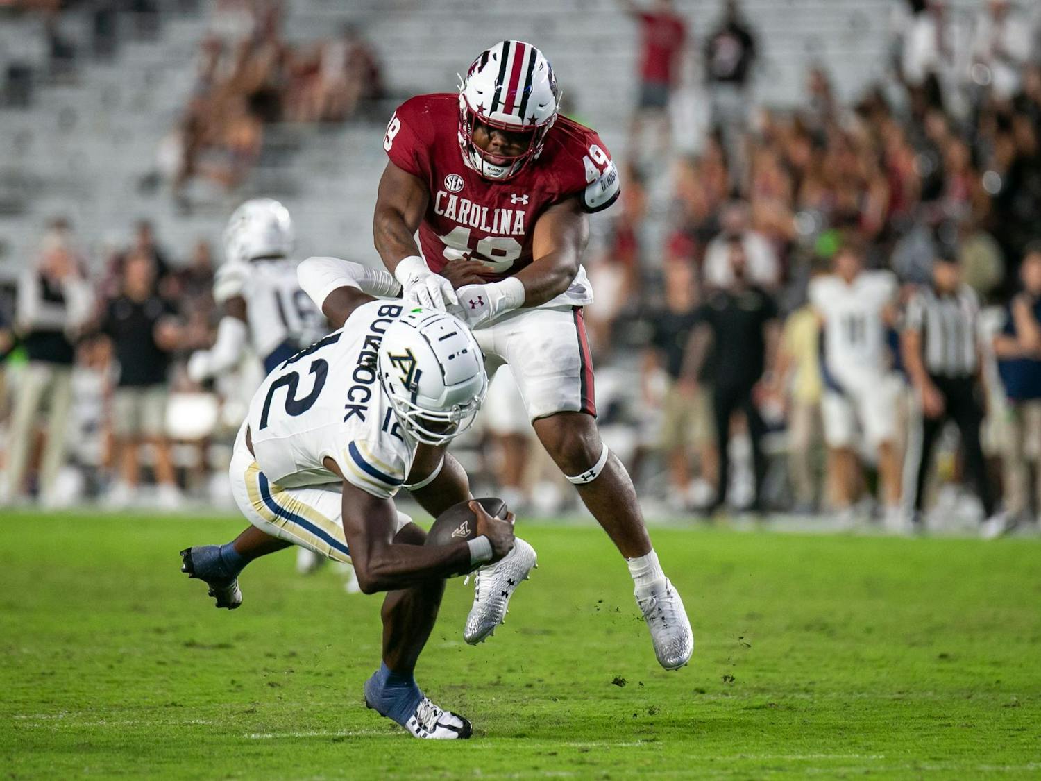 Redshirt sophomore defensive tackle Rondarius Porter sacks Zips quarterback Tahj Bullock during South Carolina's game against Akron on Sept. 21, 2024 at Williams-Brice Stadium. Porter joined the team as a walk-on in Feb. 2024.