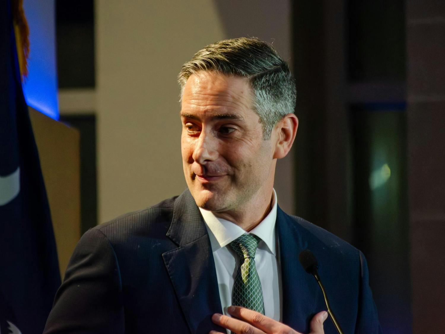 Fran Person, who served as the personal aide to Joe Biden when he was a senator and vice president, looks at the former president at an event held in his honor at the Columbia Museum of Art at 1515 Main St., Columbia, South Carolina, Feb. 27, 2026. Person is a former Gamecock offensive guard and left his position in the White House in 2014 to work at USC.