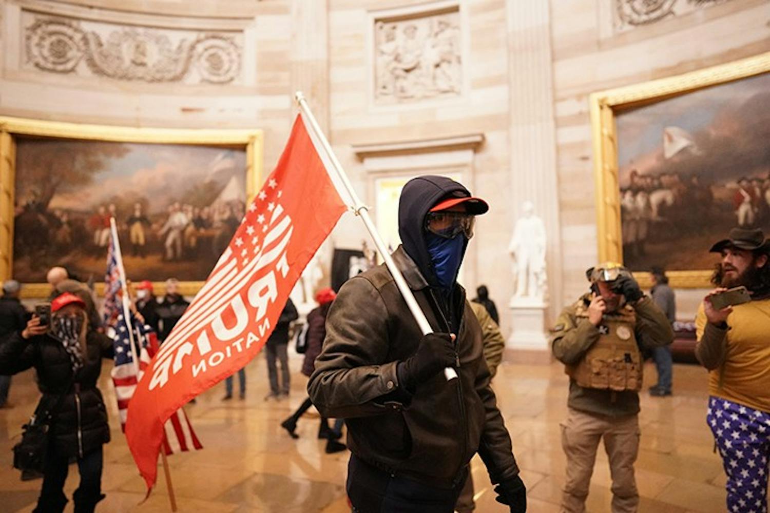 Protesters storm the Capitol and halt a joint session of the 117th Congress on Wednesday, Jan. 6, 2021, in Washington, D.C. (Kent Nishimura/Los Angeles Times/TNS)