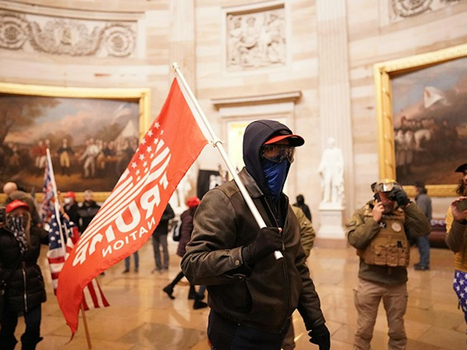 Protesters storm the Capitol and halt a joint session of the 117th Congress on Wednesday, Jan. 6, 2021, in Washington, D.C. (Kent Nishimura/Los Angeles Times/TNS)