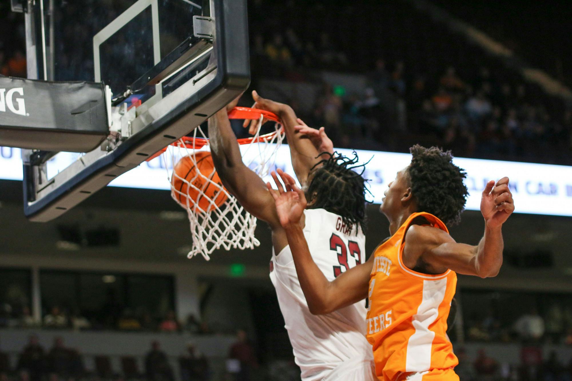 Junior forward Josh Gray dunks on his opponent on Jan. 7, 2023. The Gamecocks lost to the Volunteers 85-42.