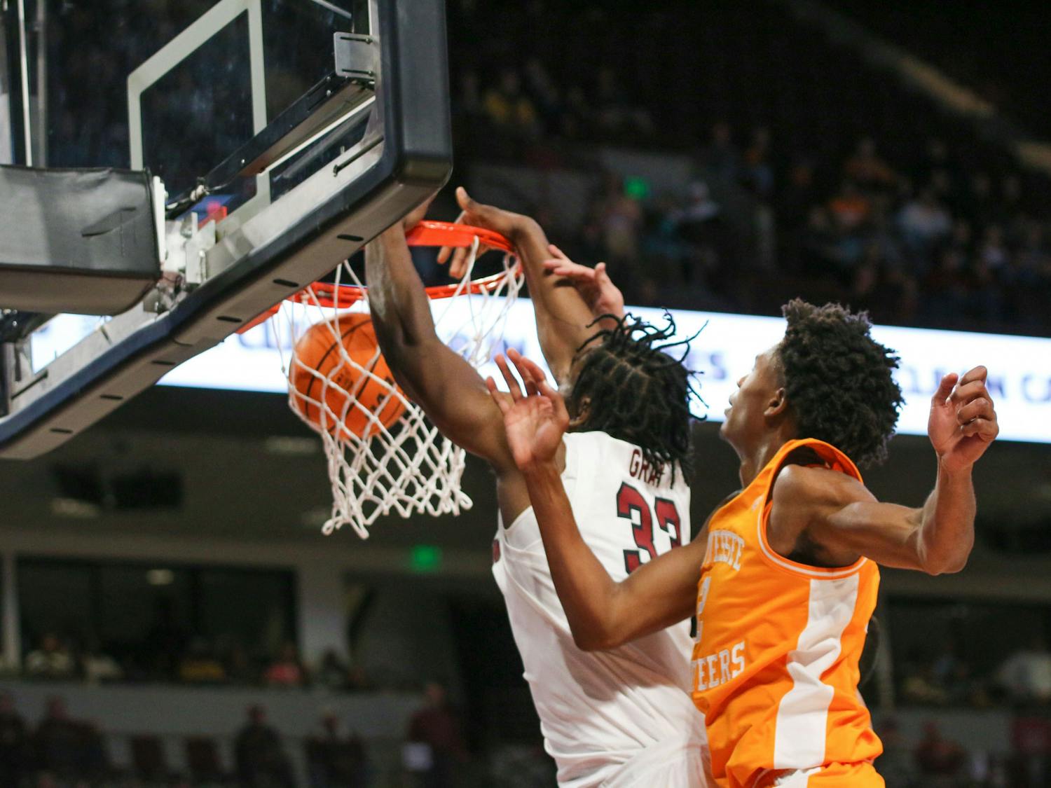 Junior forward Josh Gray dunks on his opponent on Jan. 7, 2023. The Gamecocks lost to the Volunteers 85-42.