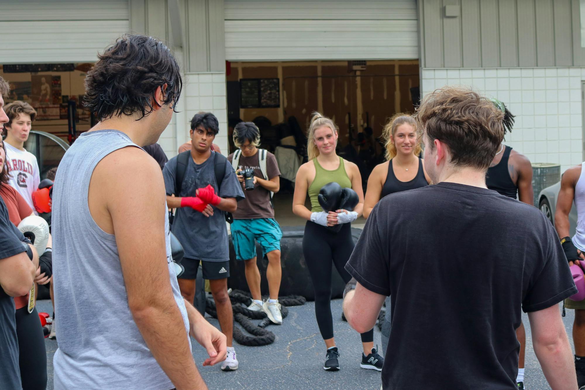 USC's Carolina Boxing Club gathers for an high-paced practice session on Sept. 12, 2022, at Battle Boxing Gym on Bluff Rd. in Columbia, S.C. The Carolina Boxing Club practices Monday, Wednesday and Friday afternoons for a variety of training sessions to prepare members for live-sparring sessions and tournaments taking place later this season.