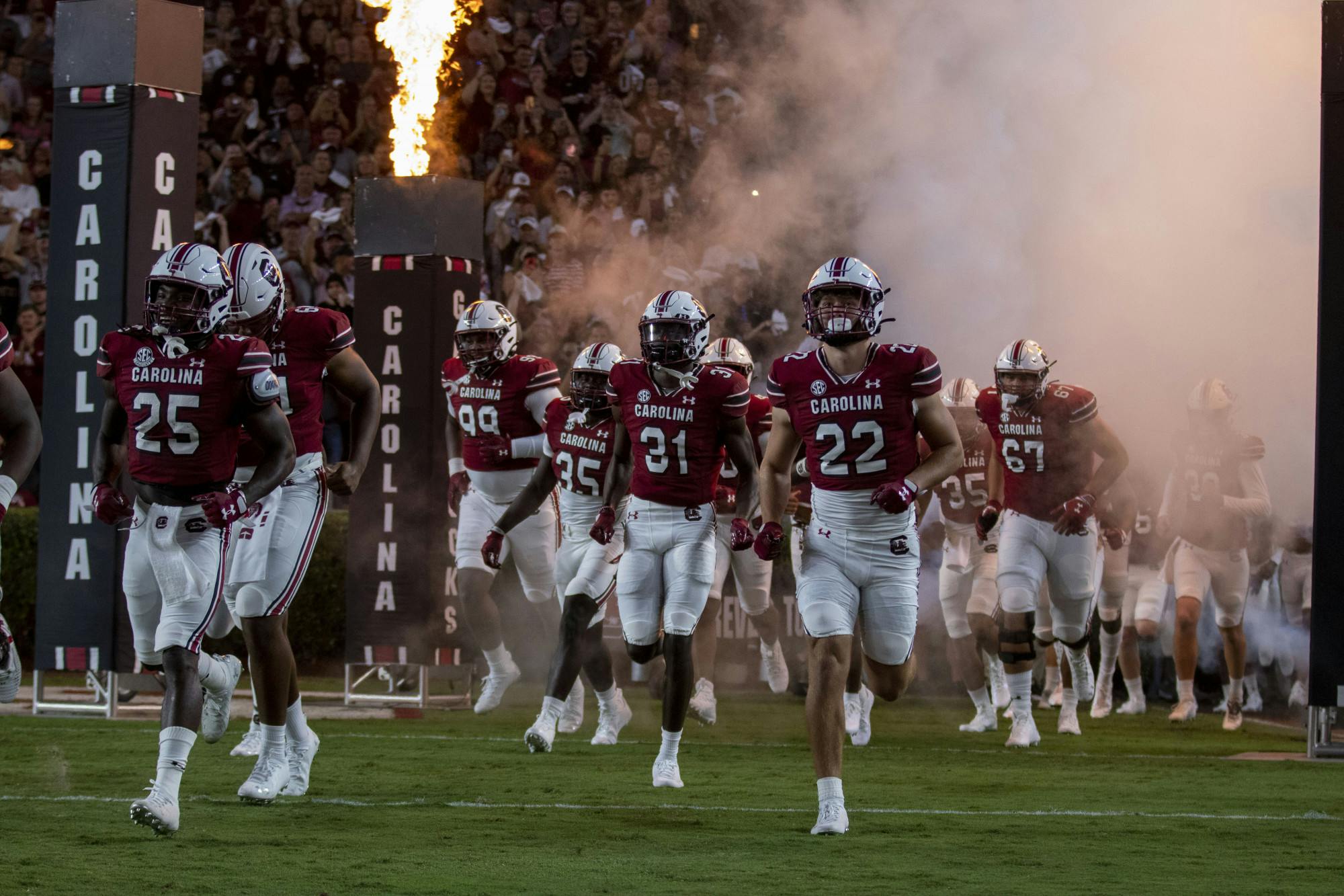 The Gamecocks run out of the tunnel before their matchup against Charlotte Sept. 24, 2022. South Carolina won 56-20.&nbsp;