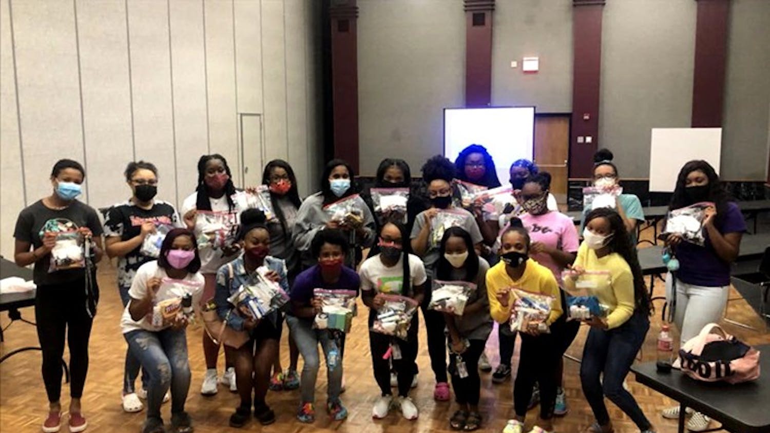 Members of SAVVY partner with Locked with Luv's breast cancer awareness event. The all-female multicultural organization provides many community service events throughout the year.