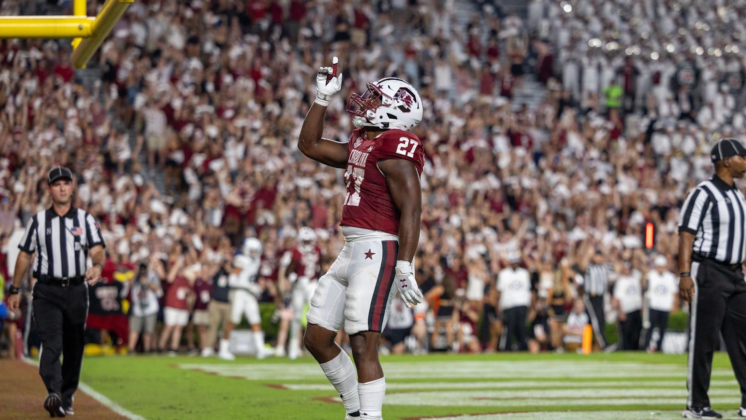 Sixth-year running back Oscar Adaway III points to the sky after scoring a touchdown during South Carolina's game against Akron on Sept. 21, 2024 at Williams-Brice Stadium. Adaway was responsible for two touchdowns in the Gamecocks 50-7 win over the Zips.