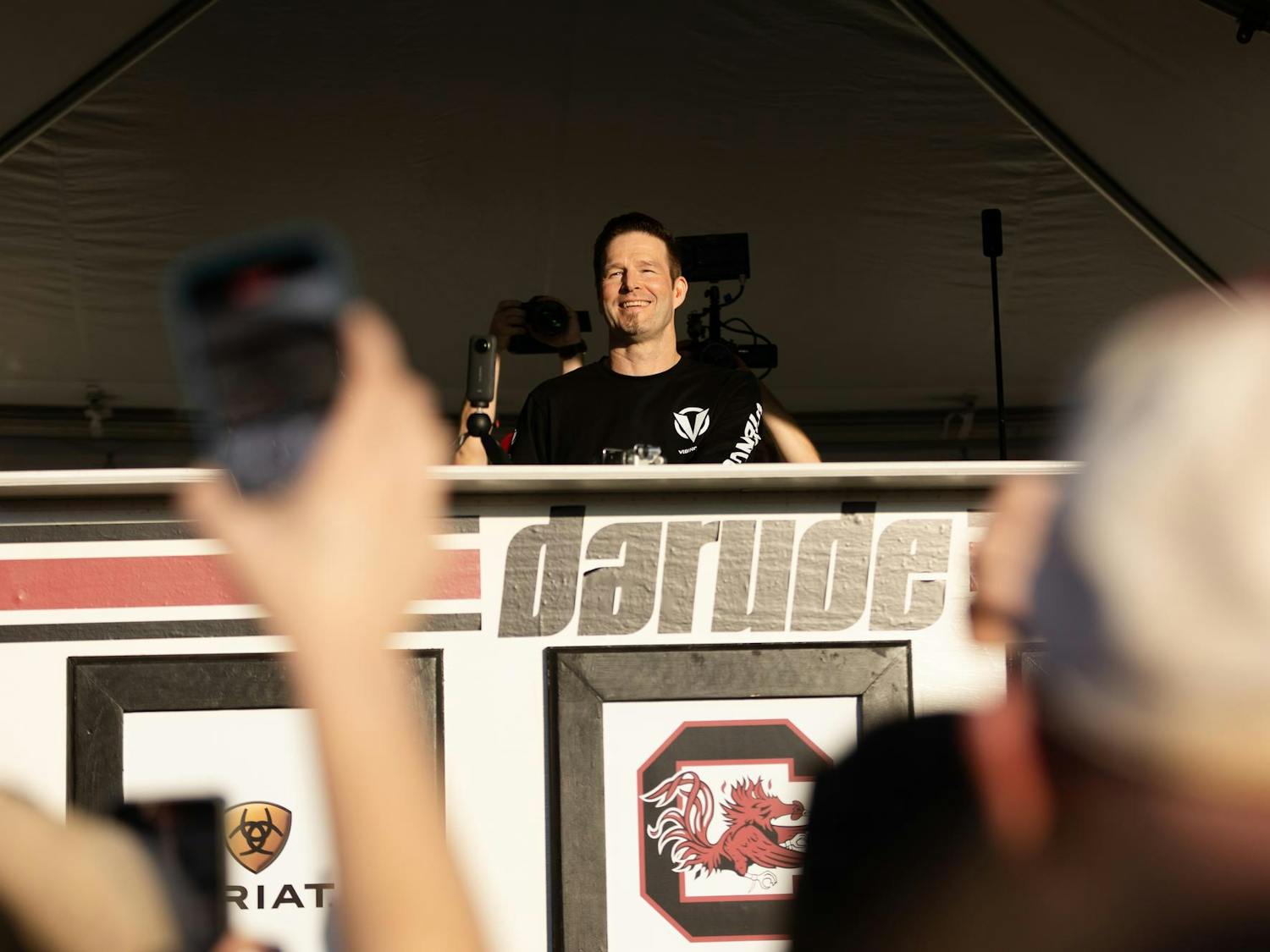 Darude performs to a crowd at Gamecock Park on Nov. 18, 2023. Fans gathered before South Carolina's game against Kentucky to hear Darude play a variety of songs from his discography, including the hit single "Sandstorm," which is now a gameday tradition.