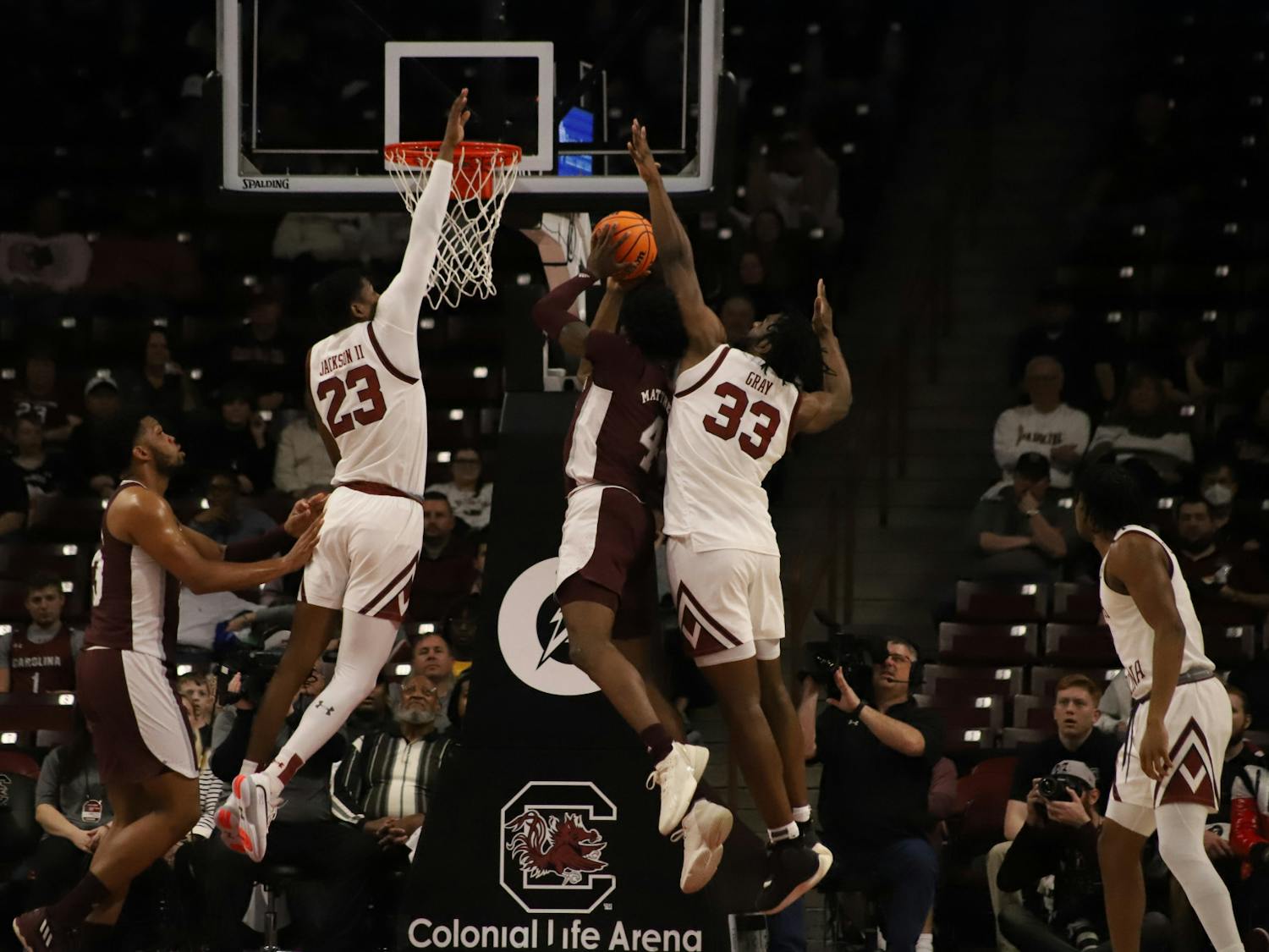 Freshman forward Gregory “GG” Jackson II and junior forward Josh Gray soar through the air to try to block Mississippi State's shot on the basket. This game was held in the Colonial Life Arena on Jan. 31, 2023. The South Carolina Gamecocks lost 66-51.