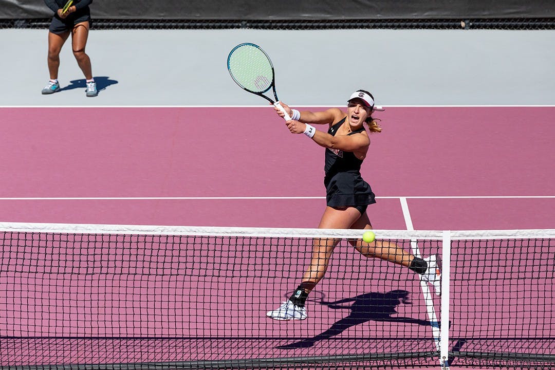 South Carolina’s junior Ana Cruz blocks Clemson’s serve during doubles on Sunday, Feb. 20, 2022. 