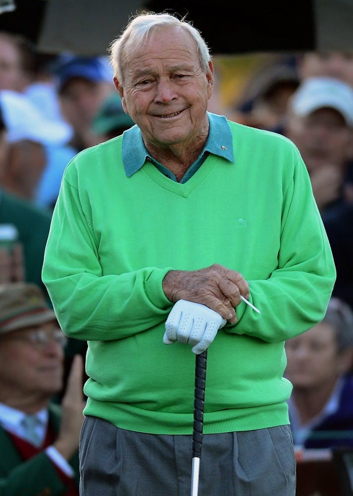 Honorary starter Arnold Palmer waits at the first tee shot to begin the Masters at Augusta National Golf Club on Thursday, April 10, 2014, in Augusta. Palmer won four Masters in 1958, 1960, 1962, and 1964 and is celebrating the 50th anniversary of his final victory.  (Jeff Siner/Charlotte Observer/MCT)