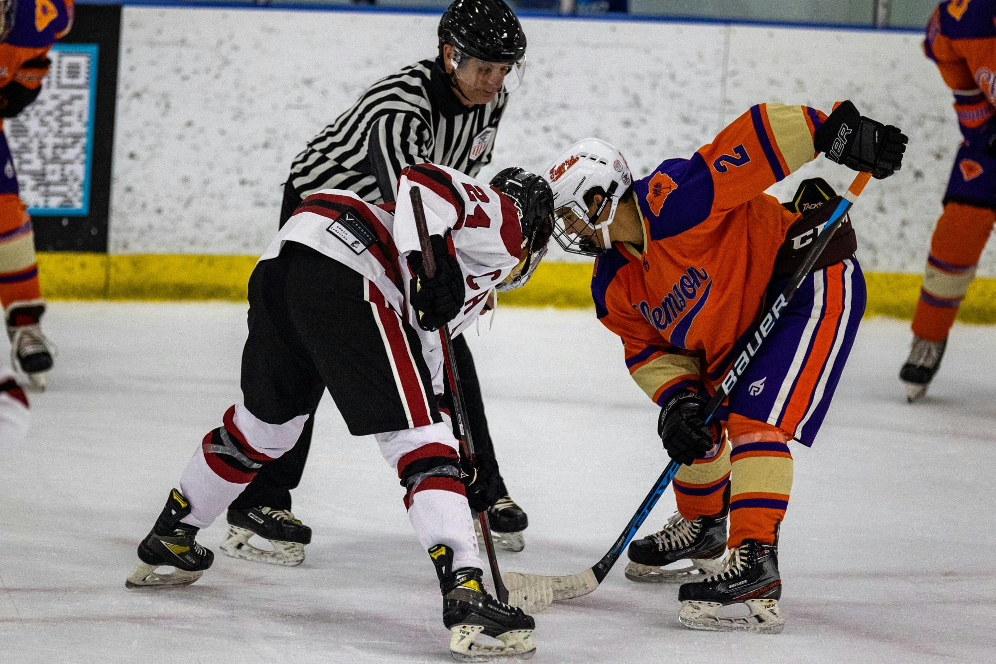 South Carolina sophomore winger Brody Smojice readies for a face-off against his Clemson opponent during a highly competitive match between the South Carolina rivals on Nov. 11, 2022. The face-off provides a brief reset for hockey players before play resumes in this high-intensity sport.