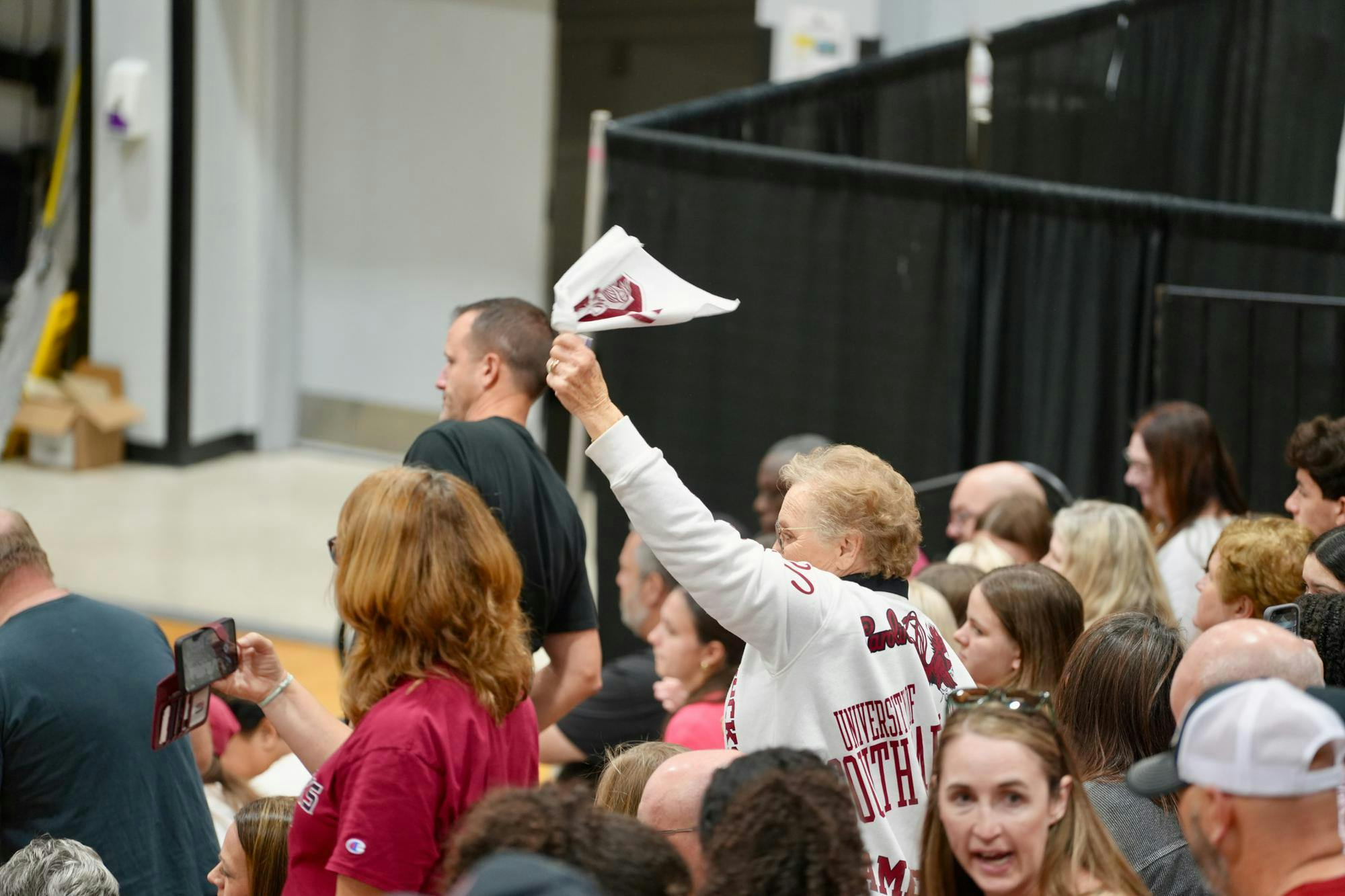 A South Carolina fan waves a rally towel during the Gamecocks’ match against Alabama on Oct. 19, 2025, at the Carolina Volleyball Center. The crowd stayed energetic throughout the match as the Gamecocks battled the Crimson Tide.