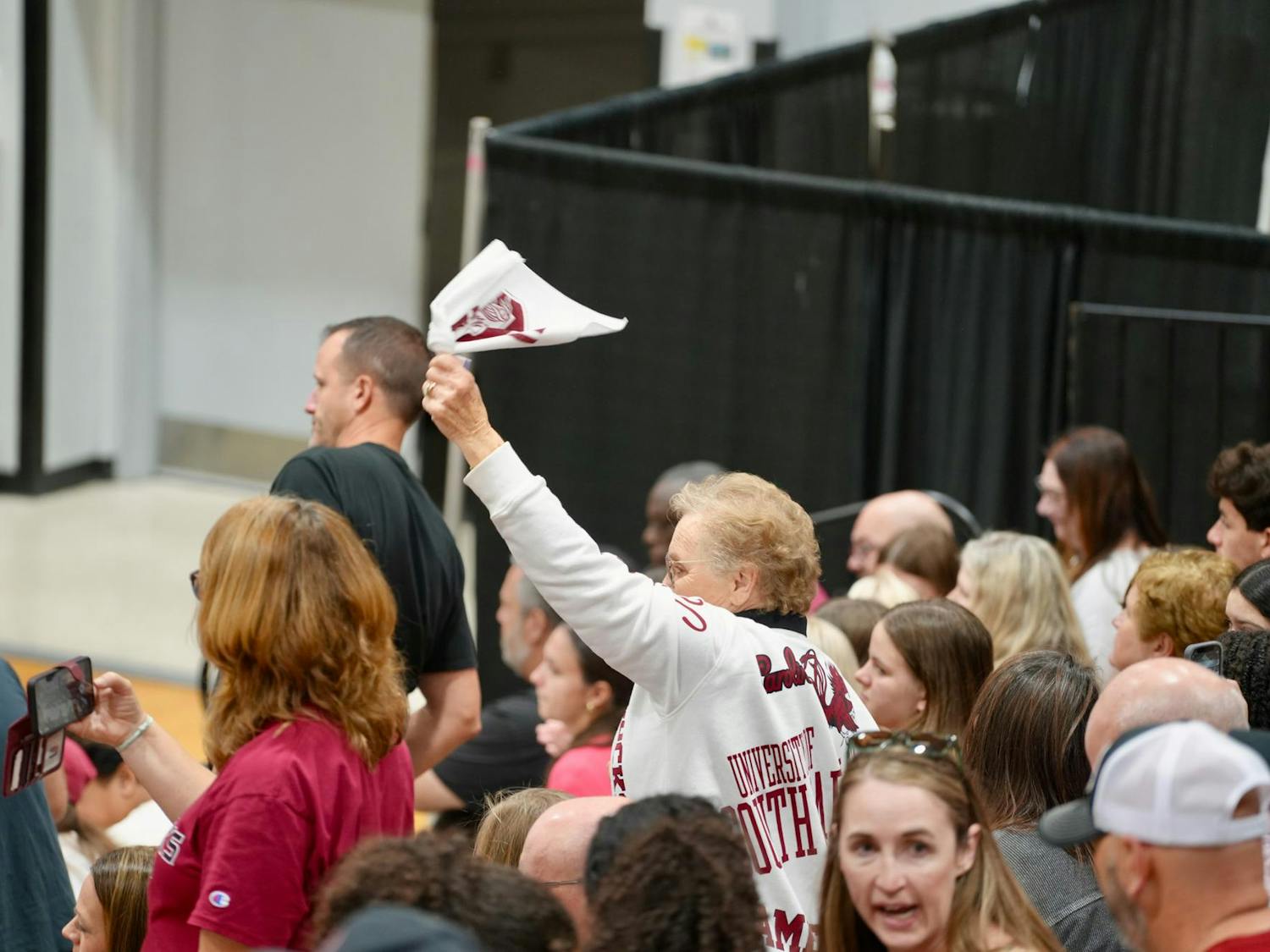 A South Carolina fan waves a rally towel during the Gamecocks’ match against Alabama on Oct. 19, 2025, at the Carolina Volleyball Center. The crowd stayed energetic throughout the match as the Gamecocks battled the Crimson Tide.