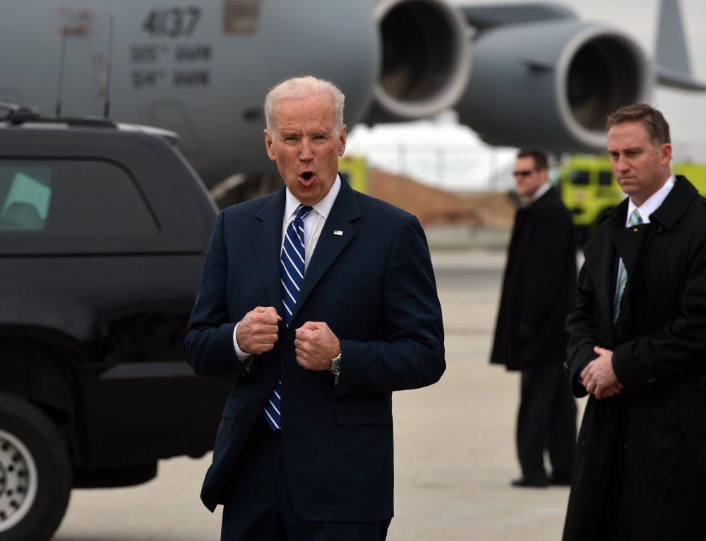 Vice President Joe Biden jokes with the press about how cold it is in Atlanta, Tuesday morning, March 4, 2014. (Brant Sanderlin/Atlanta Journal-Constitution/MCT)