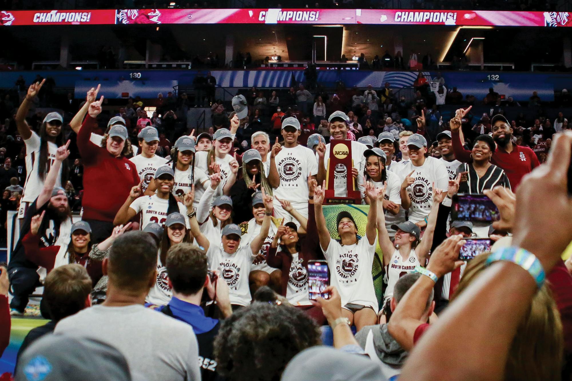 The Gamecock women’s basketball team poses with the national championship trophy on April 3, 2022. South Carolina defeated the University of Connecticut, 64-49.
