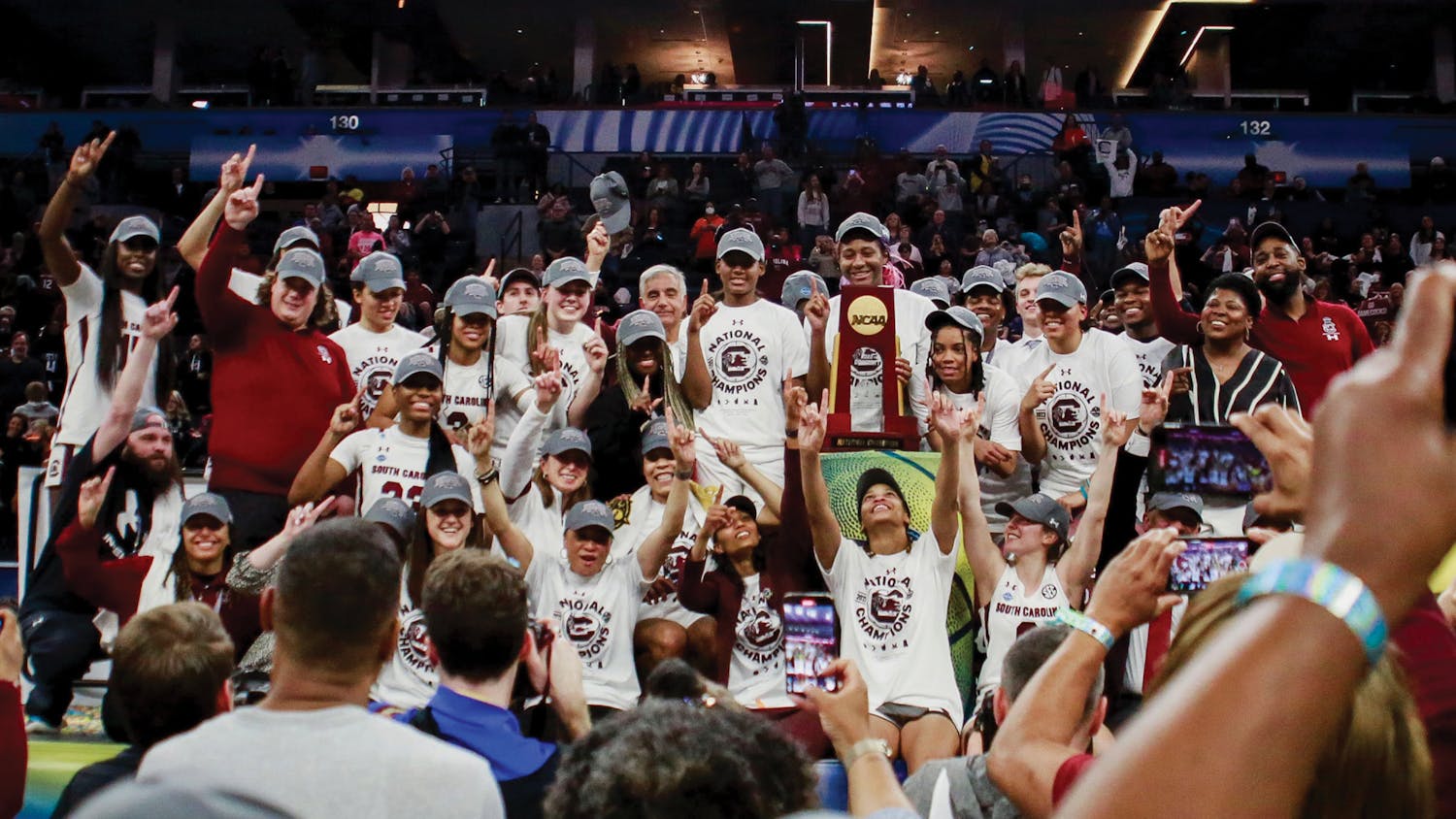 The Gamecock women’s basketball team poses with the national championship trophy on April 3, 2022. South Carolina defeated the University of Connecticut, 64-49.