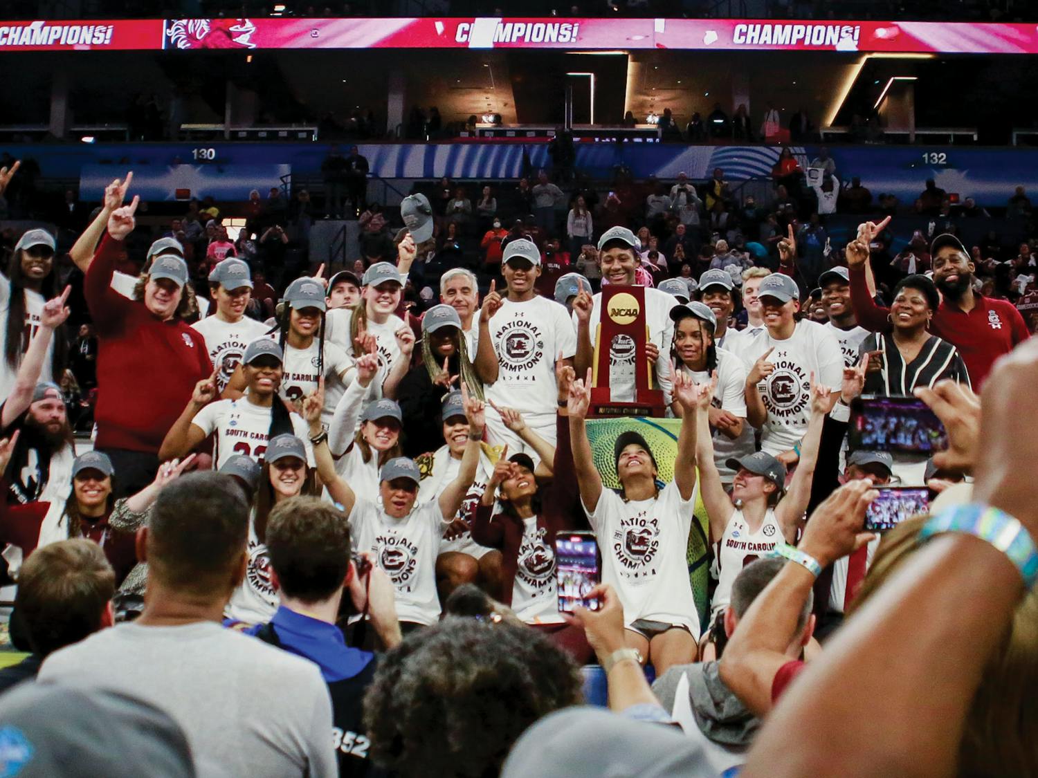 The Gamecock women’s basketball team poses with the national championship trophy on April 3, 2022. South Carolina defeated the University of Connecticut, 64-49.