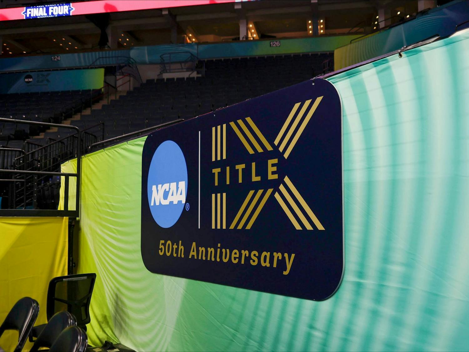 FILE— Backdrop promoting the 50th anniversary of Title IX. Title IX is a federal law that prevents discrimination based on sex by fund-receiving education programs, the law has brought about important changes to the world of women's sports.
