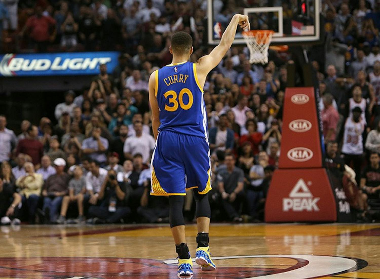 The Golden State Warriors&apos; Stephen Curry reacts after hitting a 3-pointer against the Miami Heat during the fourth quarter at the AmericanAirlines Arena in Miami on Wednesday, Feb. 24, 2016. The Warriors won, 118-112. (David Santiago/Miami Herald/TNS)