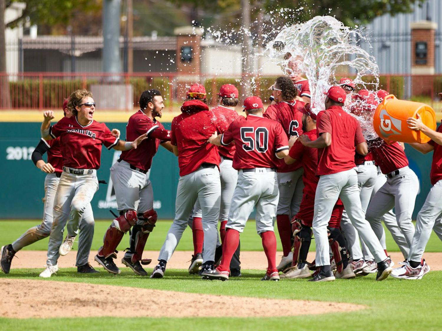 The Gamecocks' Garnet team members drench each other in Gatorade following the conclusion of their Garnet and Black scrimmage on Nov. 5, 2022. Garnet won the game 5-1, earning the victory in this year's Garnet and Black World Series.