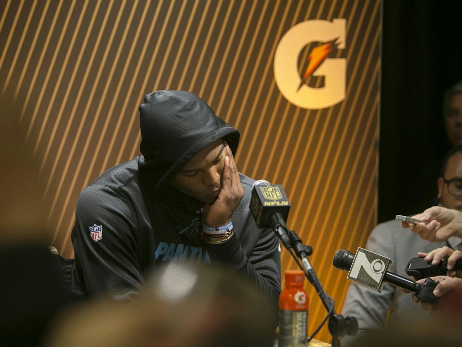 Carolina Panthers quarterback Cam Newton speaks to the media at a postgame news conference following a 24-10 loss against the Denver Broncos in Super Bowl 50 at Levi's Stadium in Santa Clara, Calif., on Sunday, Feb. 7, 2016. (LiPo Ching/Bay Area News Group/TNS)