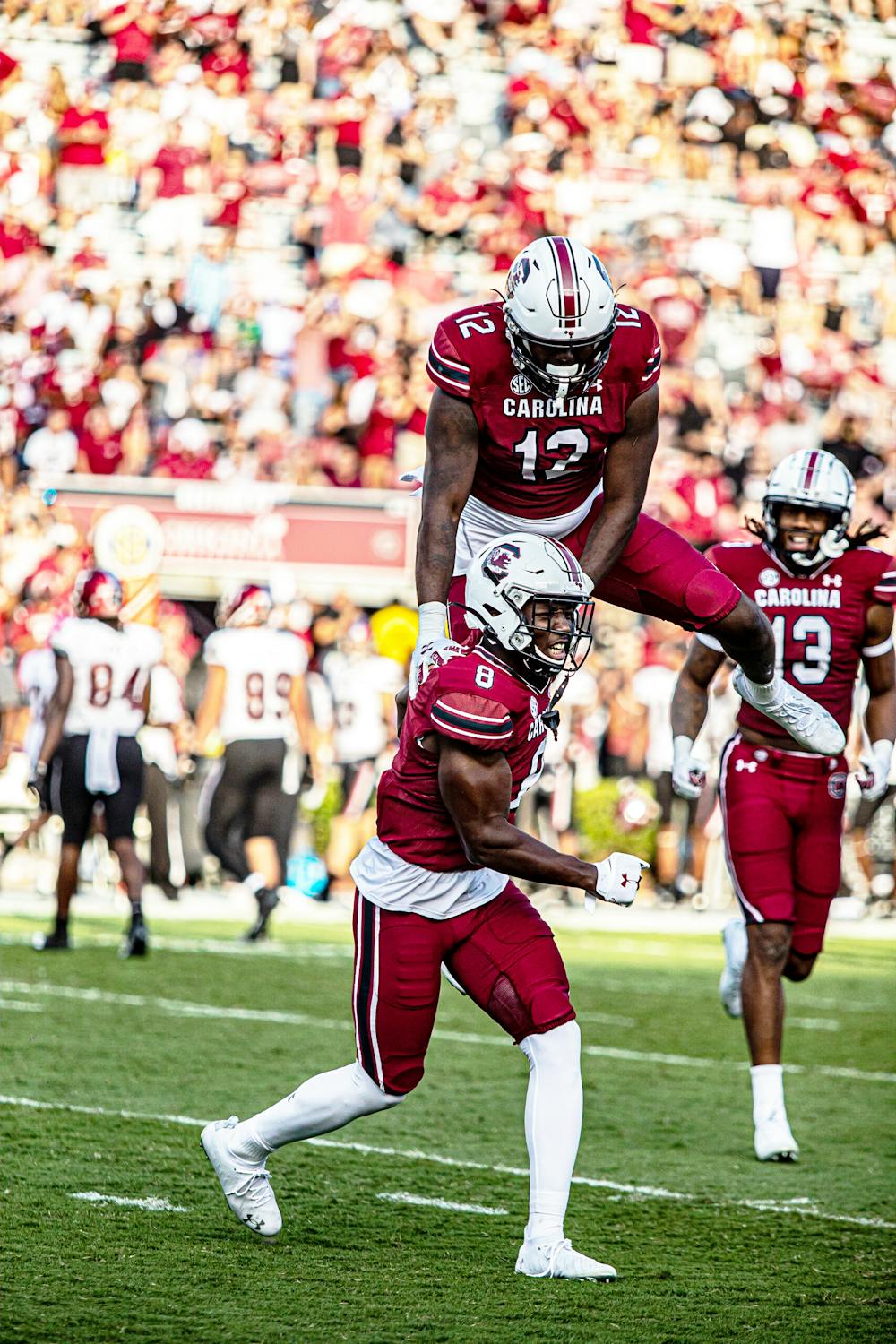 Redshirt sophomore defensive back Jahmar Brown and redshirt senior defensive back Jaylan Foster celebrate after a big play at the Troy Football Game on Saturday, Oct. 2nd, 2021. 