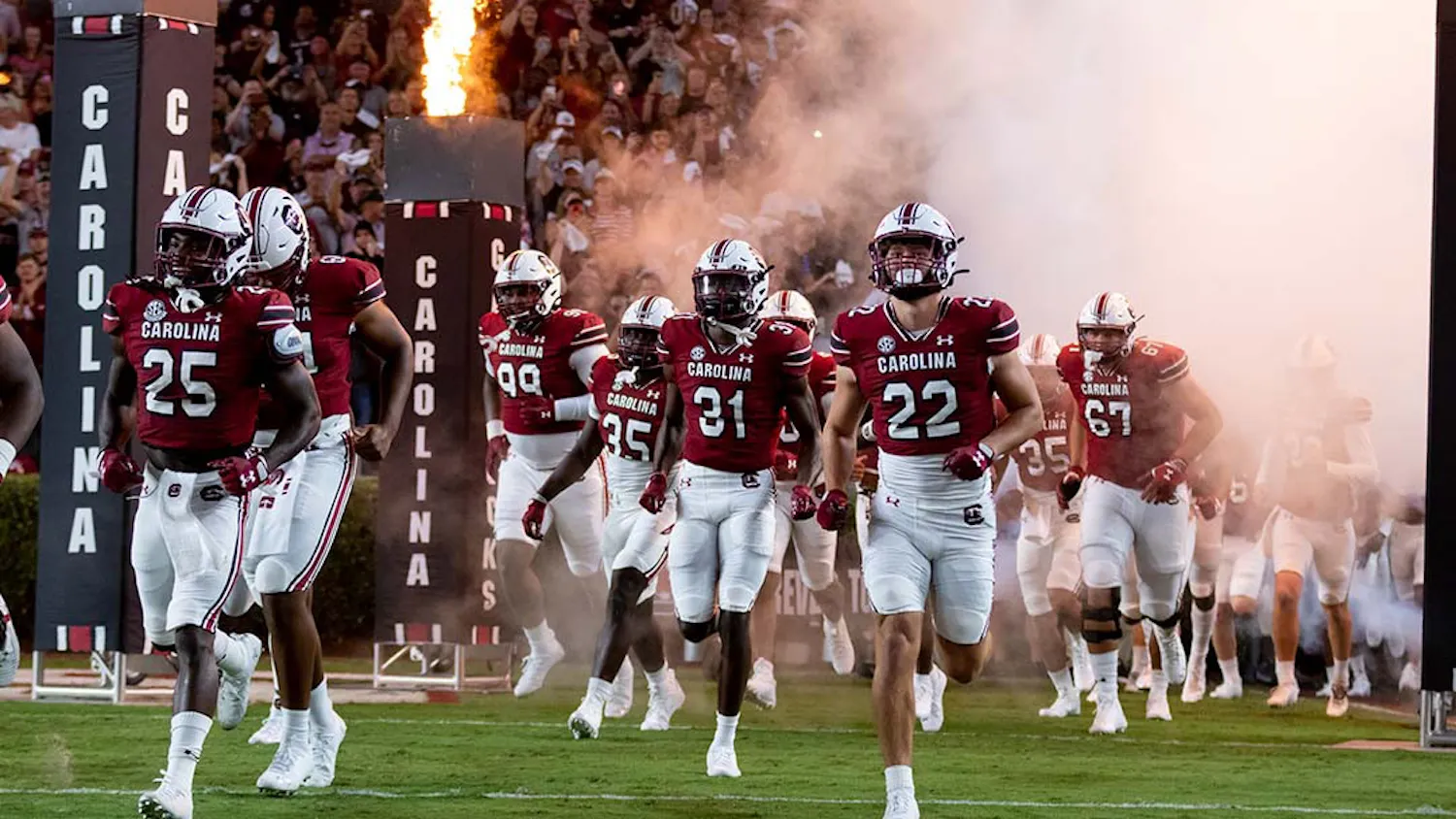 FILE — The Gamecocks run out of the tunnel at Williams-Brice Stadium on Sept. 24, 2022. The Gamecocks won against the Charlotte 49ers 56-20.