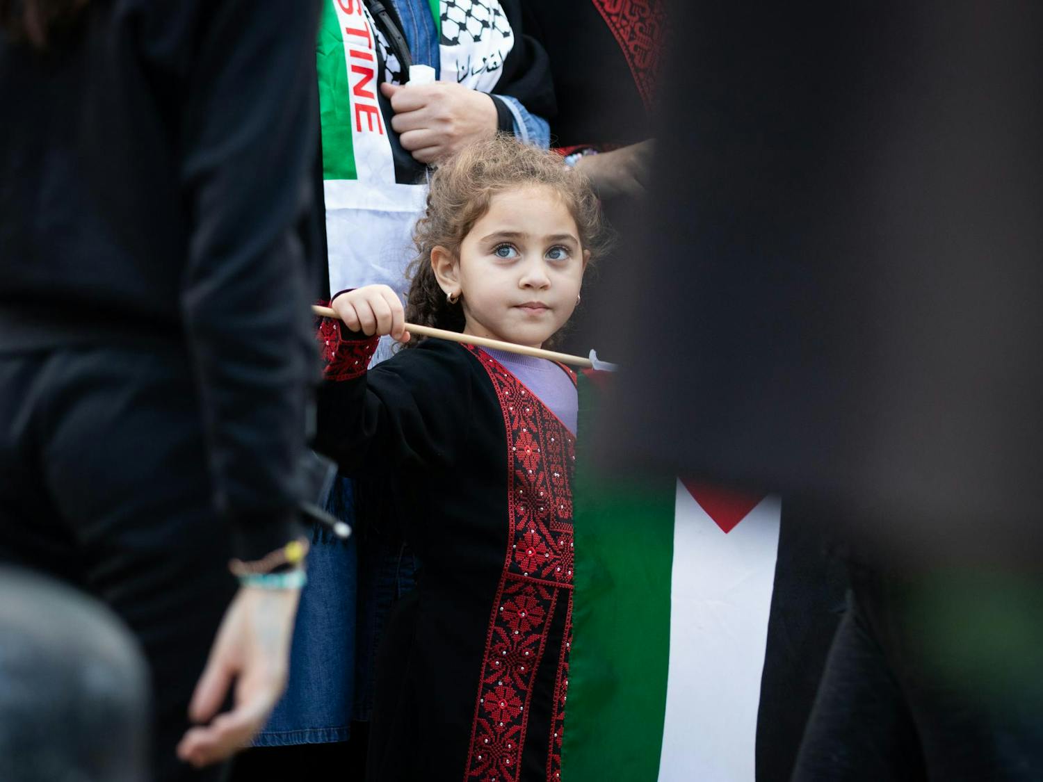 A child stands holding a Palestinian flag at the Free Palestine Emergency Demonstration on Oct. 17, 2023. The rally was organized by the North and South Carolina Party for Social Liberation on Statehouse grounds in Columbia, S.C.