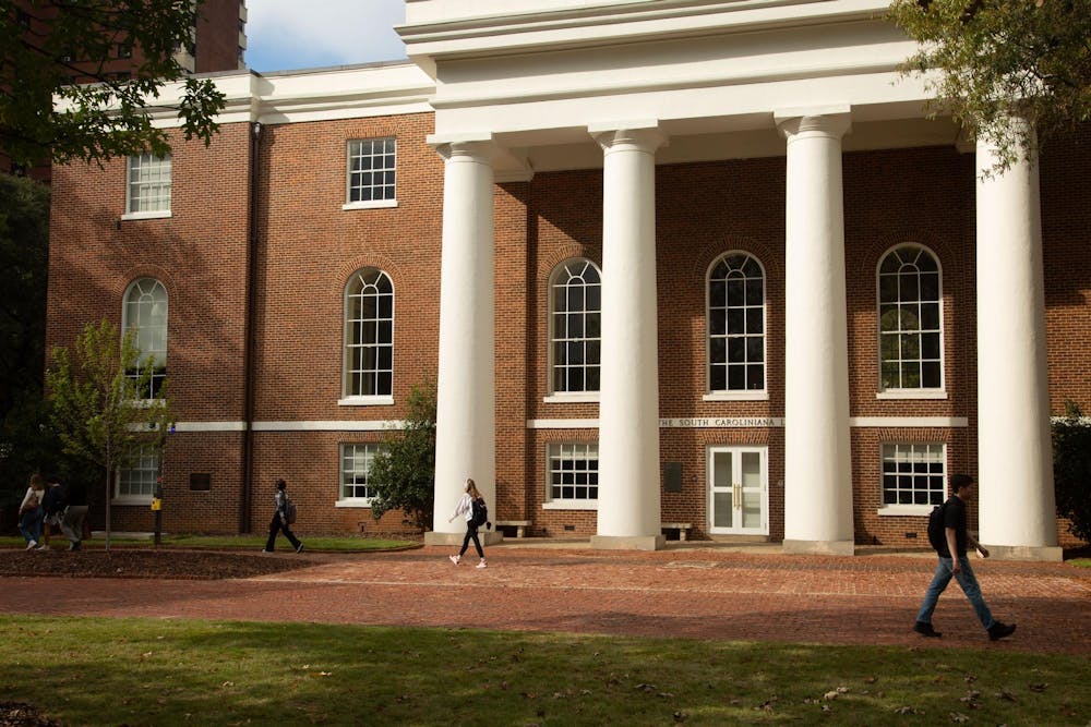 <p>On Nov. 11, 2024, students pass by the South Caroliniana Library in the Horseshoe on the way to class. The South Caroliniana Library has served as the university’s library for 100 years and is listed on the National Register of Historic Places.</p>