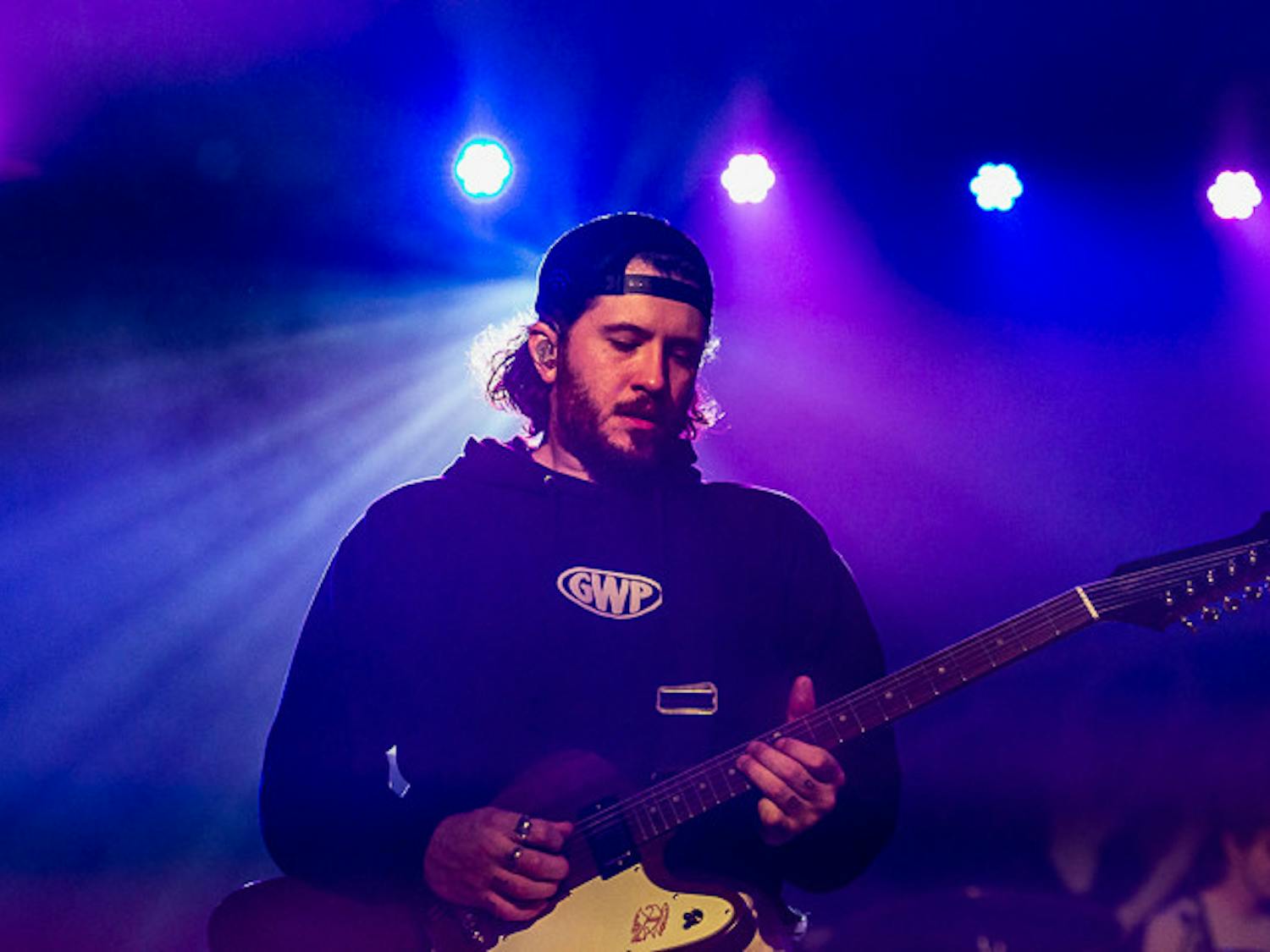 The Band CAMINO singer and guitarist Spencer Stewart performs a guitar solo on stage. The Band CAMINO performed at The Senate on Sept. 15, 2022. Steward performed both guitar and vocals during their performance of "Never A Good Time."