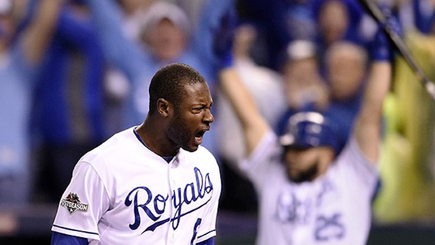 The Kansas City Royals' Lorenzo Cain celebrates scoring on an RBI single in the eighth inning by Eric Hosmer against the Toronto Blue Jays during Game 6 of the ALCS on Friday, Oct. 23, 2015, at Kauffman Stadium in Kansas City, Mo. (Shane Keyser/Kansas City Star/TNS)